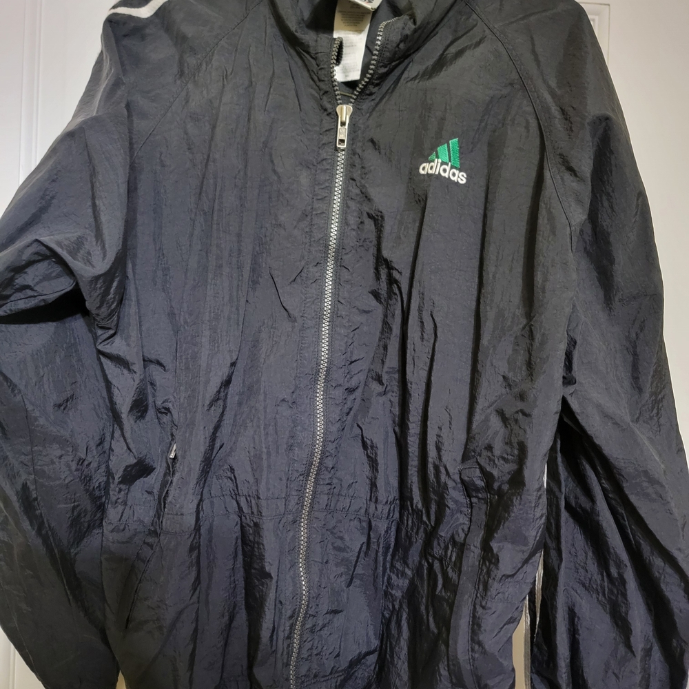 Adidas Black and Green Light Jacket.